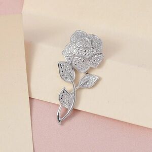 Diamond accent rose pendant. Platinum over sterling silver!